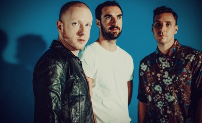 'There are a lot of positive signs for guitar bands': Two Door Cinema Club talk False Alarm and Glastonbury