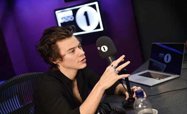 Harry Styles is gunning for Ed Sheeran at the top of the singles chart