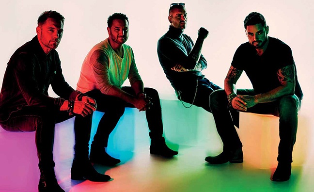 'It's time to hang up our dancing shoes': Boyzone talk bowing out after 25 years