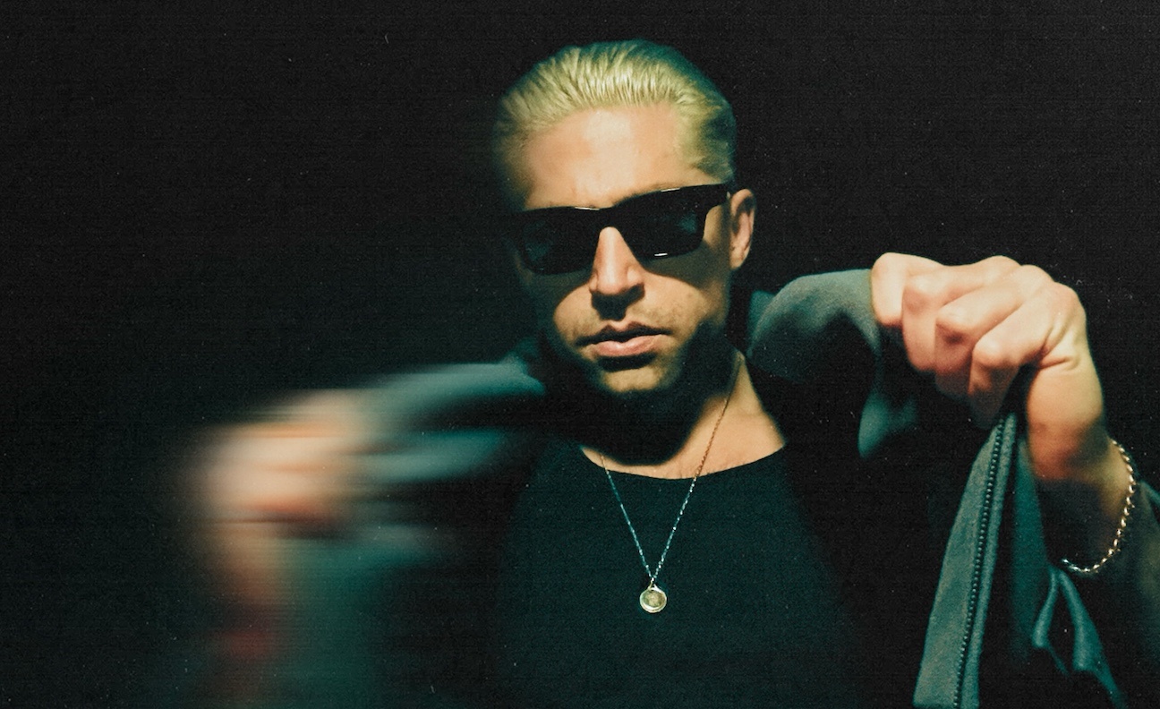 FLG signs Queens Of The Stone Age bassist Michael Shuman for solo project GLU